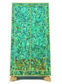 A turquoise “Trapezium” cabinet