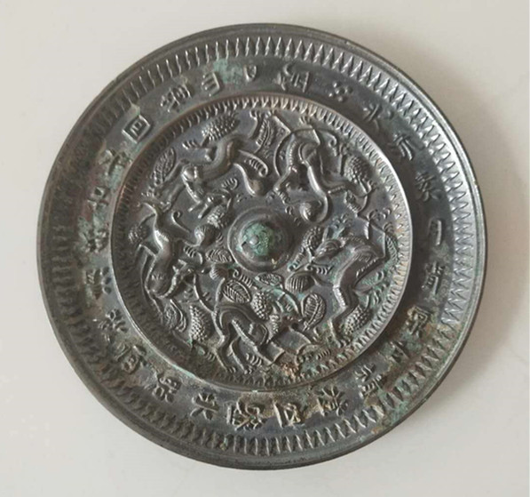 唐代瑞兽葡萄纹铭文铜镜